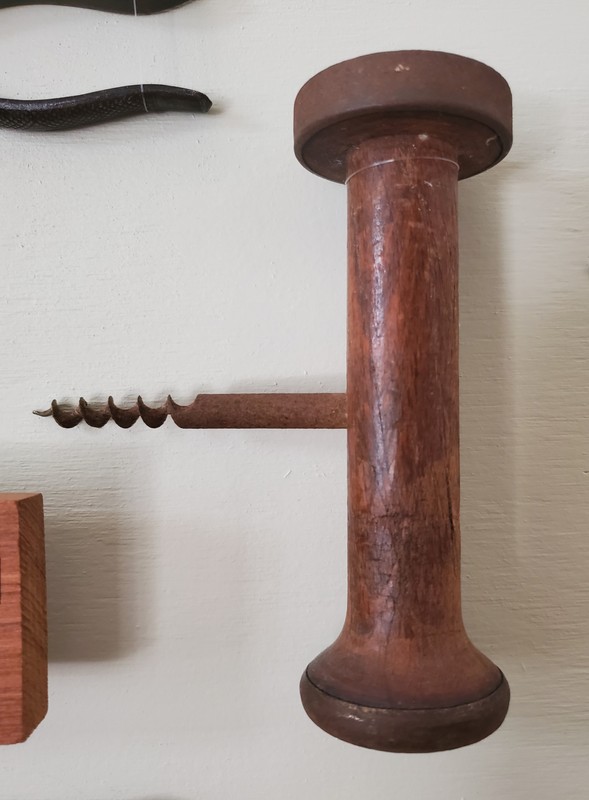 Gimlet: Small hand auger used to pre-drill holes for nails and screws to avoid splitting planks.