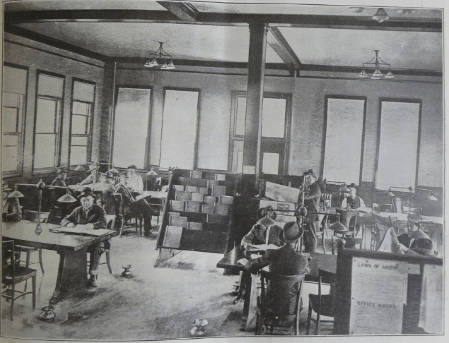 Patrons in the first floor of the Copper Queen Library circa 1910s. Photo courtesty of the Bisbee Mining and Historical Museum