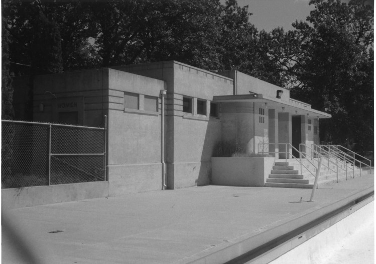 Art deco-styled concrete bathhouse building.