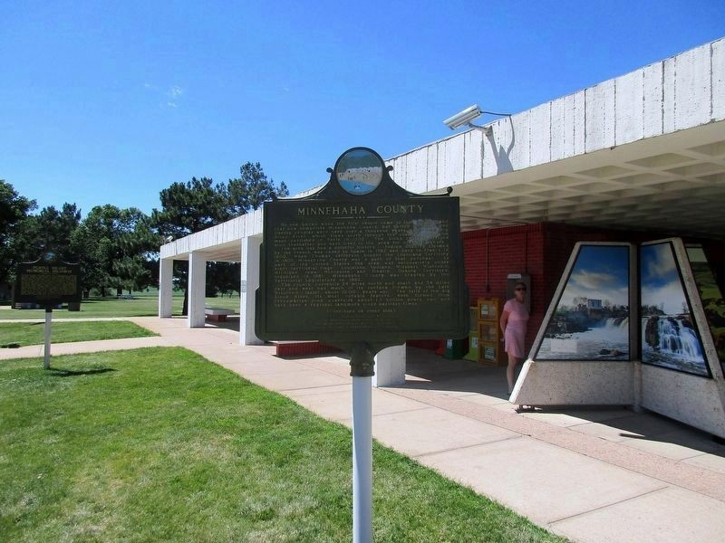 The marker is just in front of the information center