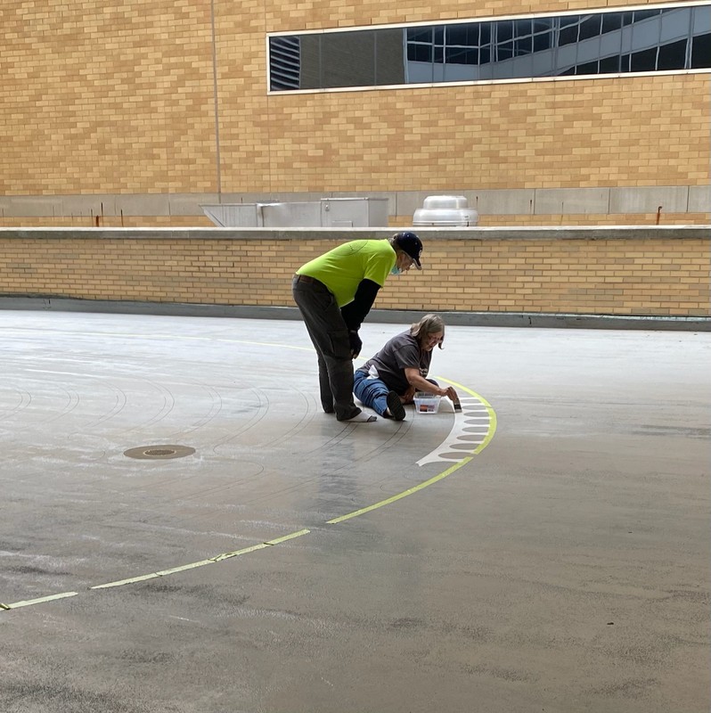 Painters working on repainting the Labrynth