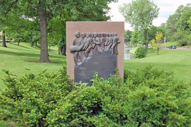 Interpretive plaque, Troost Park. The site of the first log schoolhouse, built by Joseph Smith and other Mormon migrants. 