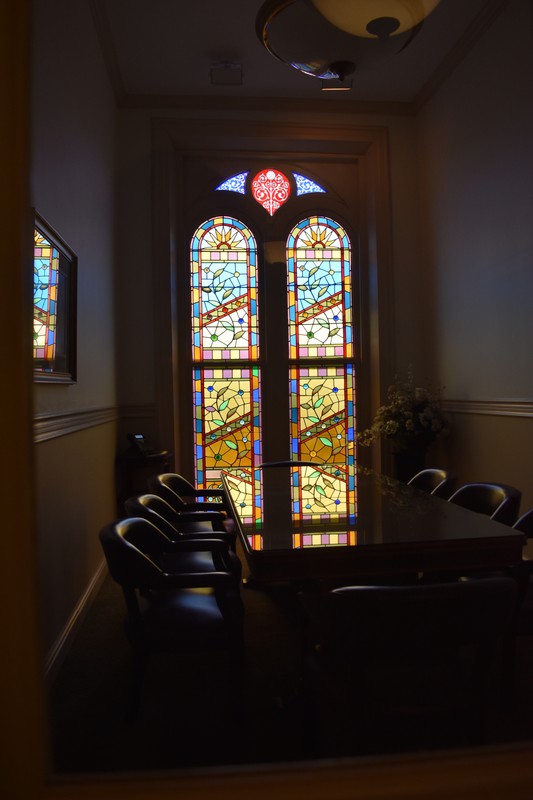 Here is the conference room on the first floor of Miller Hall, outside of the Provost's Office, with a specially designed stained-glass window.