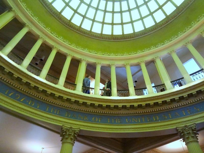 Period actors dressed as Hamilton and Jefferson in the bank's rotunda.