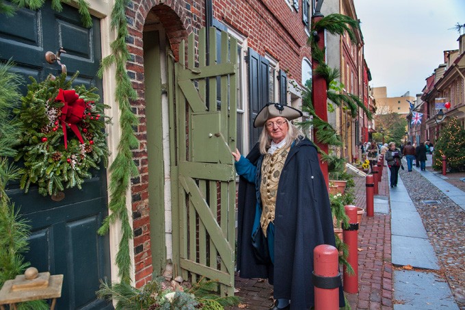 Ben Franklin pays a visit during Deck the Alley celebrations.