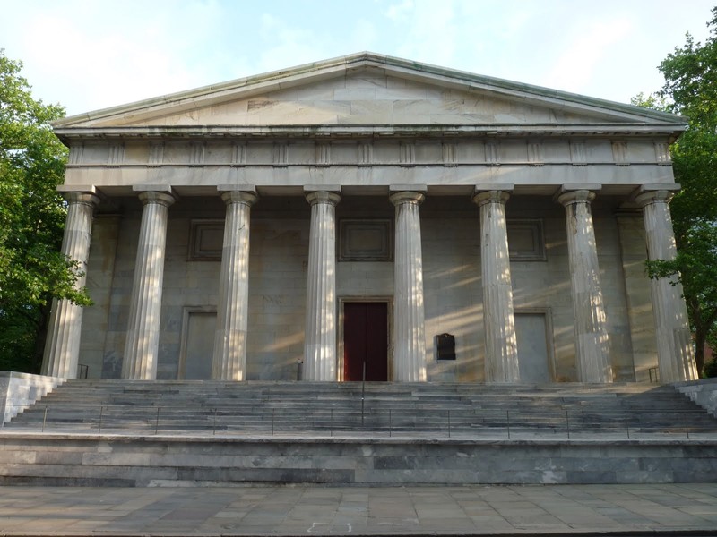 The Greek Revival Second Bank of the United States with its wide staircase and huge Doric columns.