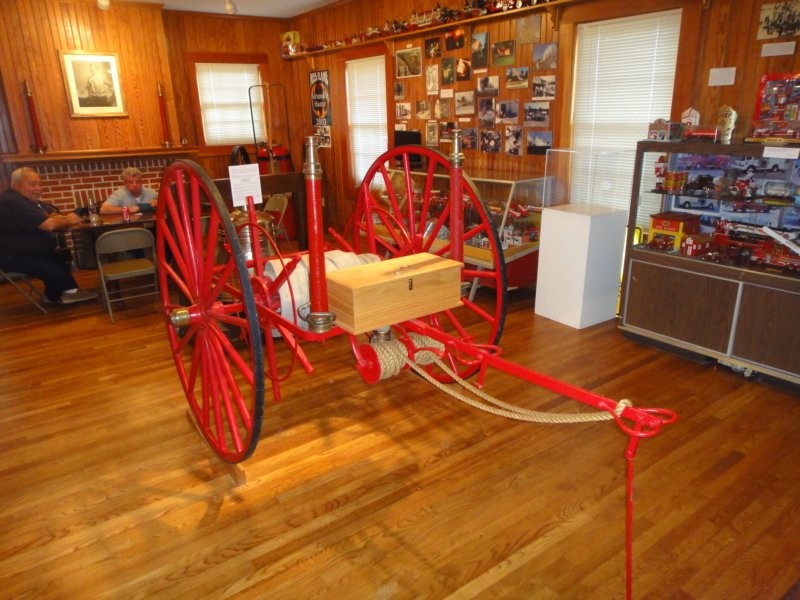 An antique fire pumper