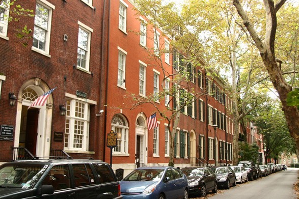 Delancey Place, home to the Rosenbach identified by the two American flags hanging out front and the Pennsylvania historical marker.