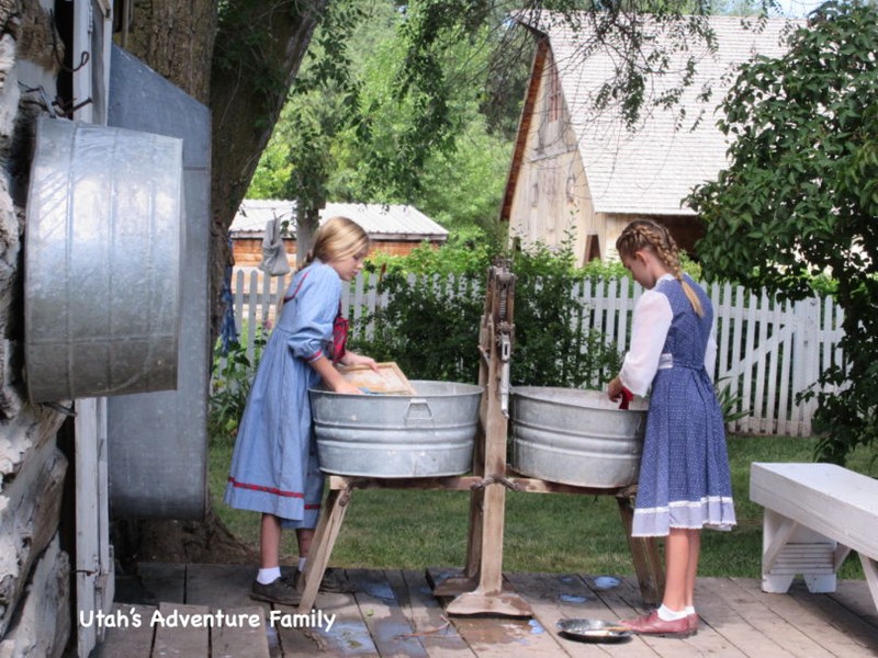 Pioneer girls washing clothes