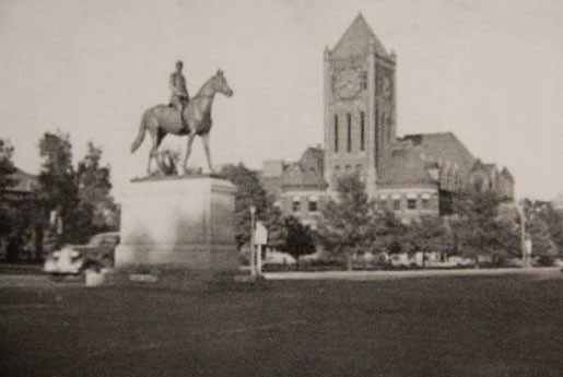 Circa 1930s. The General William Palmer statue sits in front of the original high school.