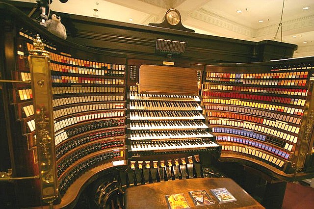 The organ's playing platform with six keyboards and over 420 stops. (Photo from Bibliolore, reproduced under Fair Use)  These, combined with its 28,500 pipes, make it the largest operational organ on the globe.