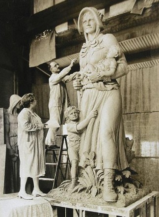 August Leimbach sculpting the Madonna of the Trail figure. 