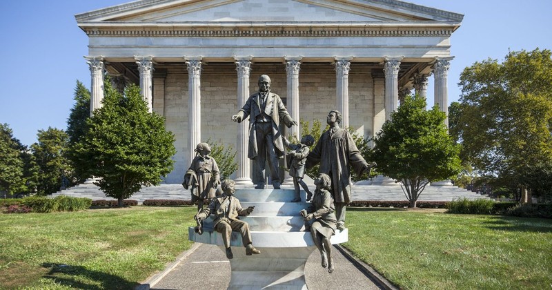 The front of Founder's Hall features a sculpture of founder, Stephen Girard, surrounded by those his school was designed to help; children.  