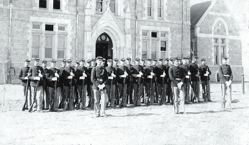 Cutler Hall Drill Academy standing in front of Cutler Hall in 1892