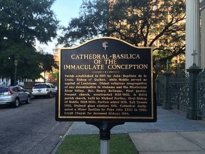 The historical marker is located in front of the cathedral