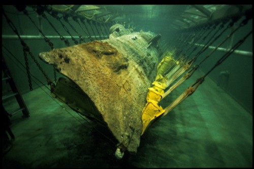 The Hunley in the recovery tank after it was recovered.