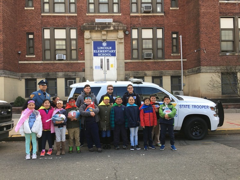 This was a photo that was taken around Thanksgiving, after Officer Cruz (left) and the PTO donated turkeys to families of students in need. Lincoln Elementary School fosters a sense of community with its students and New Brunswick as a whole.