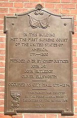 The plaque that adorns Old City Hall identifies the years it served as home to the Supreme Court, its Chief Justices that served here (John Jay, John Rutledge, and Oliver Ellsworth), and the years its was home to city hall.