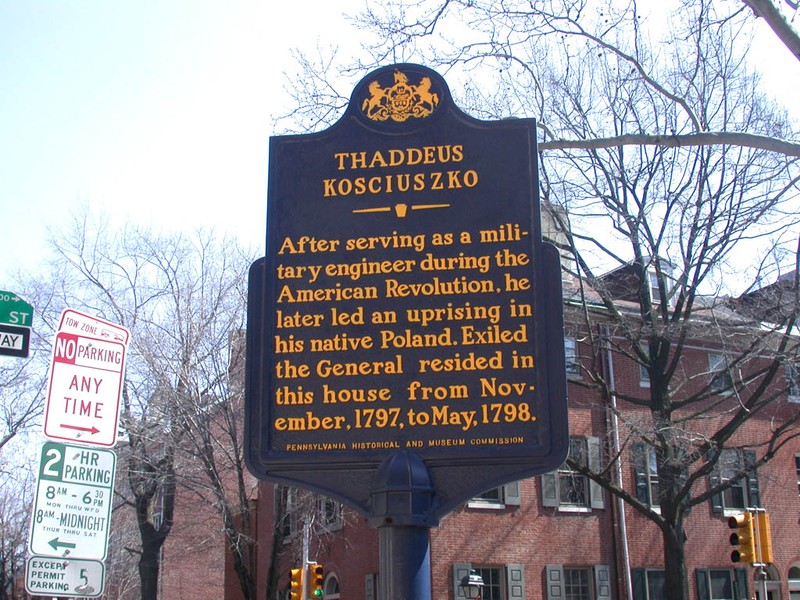 The historical marker located across the street from the memorial.