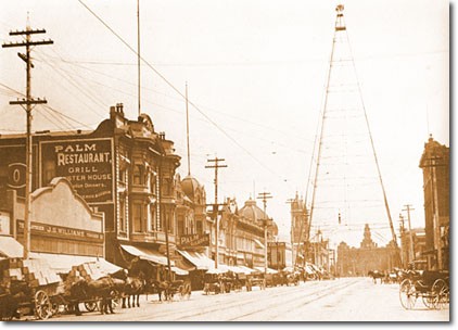 The tower in 1905, with San Jose's old City Hall in the background (image from the City of San Jose)