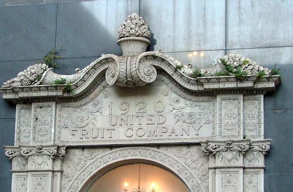 Although United Fruit no longer occupies the building, the main entrance and interior retain the name of the company and friezes depicting tropical fruit. 