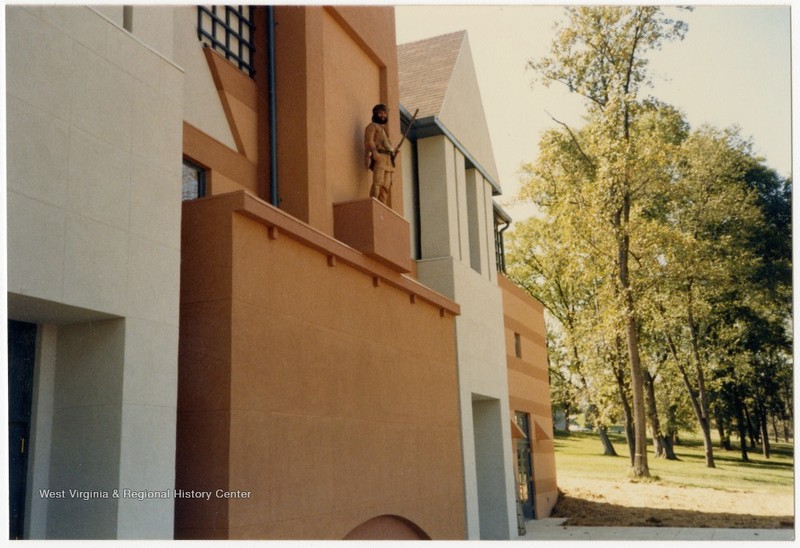 WVU's Mountaineer Mascot poses on the then Erickson Alumni Center at its grand opening in 1986