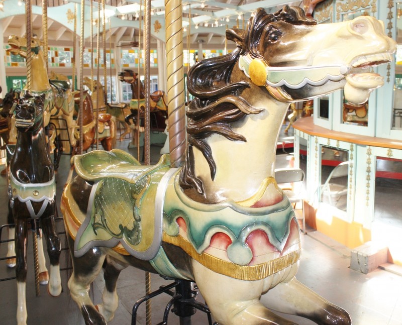 A close-up of one of the carousel's horses. They typically must be re-painted, by hand, on an annual basis due to their popularity.