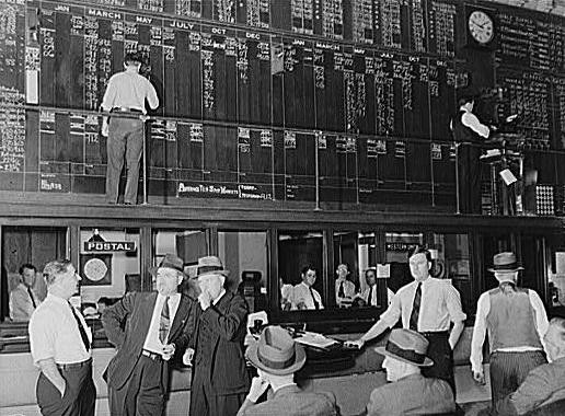 Men trade in cotton futures on the floor of the Cotton Exchange in the 1940s.