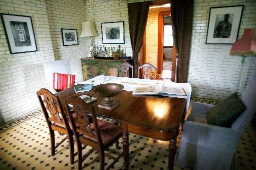An eating area on the Steamboat House's first floor.  Notice that the walls are clad entirely in ceramic tiles which saved the home from extensive flood damage, post-Katrina.  