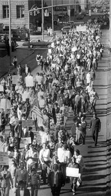 On November 9, protesters take to the streets the day after the school board reinstates the books.