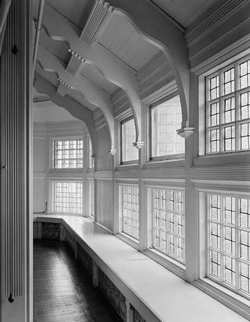 The second floor hallway and its unique windows.