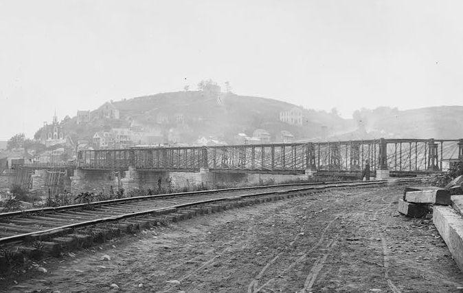 Old photo of the Bollman Bridge from the Maryland side, ca. 1851