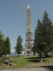 The Saratoga monument is located in the National Historic Park in a small village called Victory in eastern New York.
