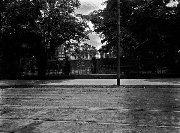 Jackson Barracks, circa 1910s: The surrounding fence of the Barracks, as seen from what is St. Claude Avenue today. Courtesy of Louisiana Division/City Archives, New Orleans Public Library