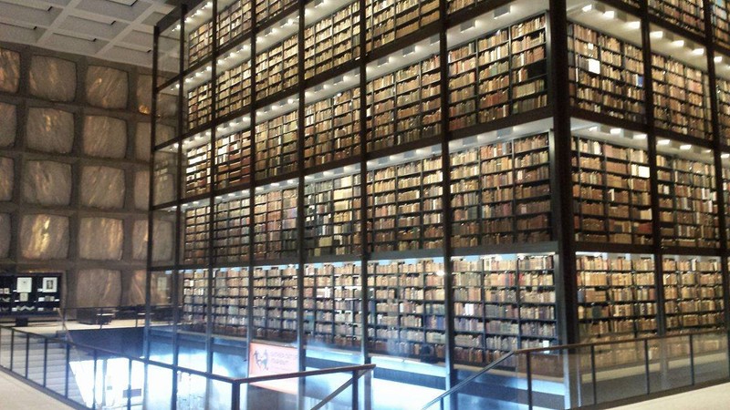 Inside the Beinecke: the space is partially lit by natural light filtering through the marble walls. (source: Burt Westermeier)