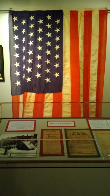 2018-19  Wright-Powers family flag hung at the Powers Home for the 1918 armistice and the 1919 signing of the Treaty of Versailles. Part of "Over here and over There" exhibit.