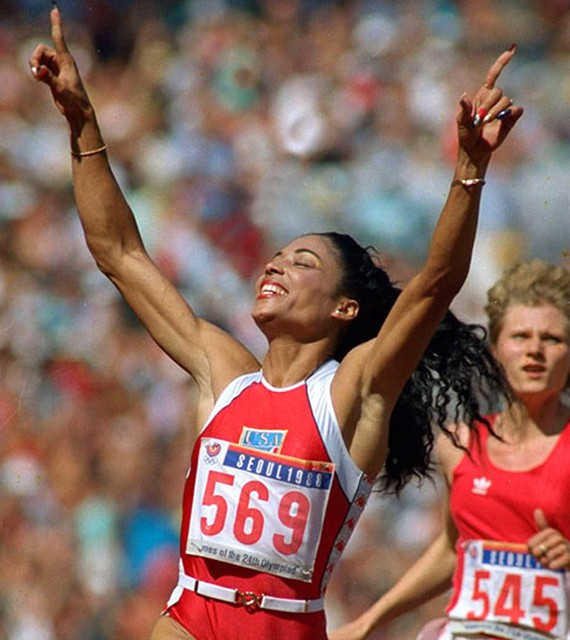 1988 Seoul Olympics is where Florence made history as a world record holder in the 200 and 100 meter dash. UCLA Athletics captures Florence crossing the finish line during 1988 Seoul games.