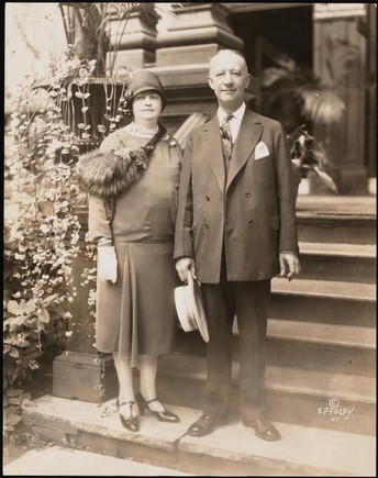 Governor Al Smith and First Lady Catherine Smith on the steps of the Executive Mansion.  