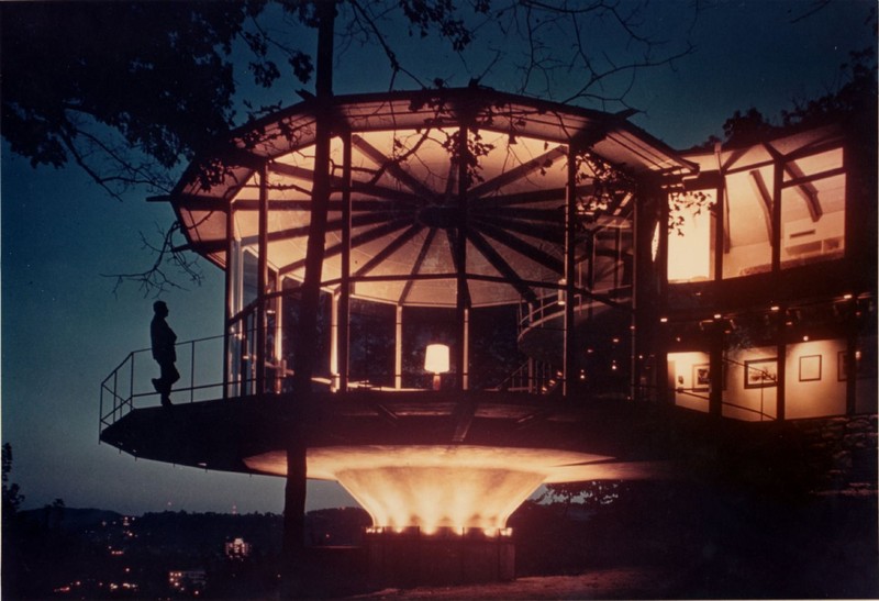 A nighttime view of one circular lounge.