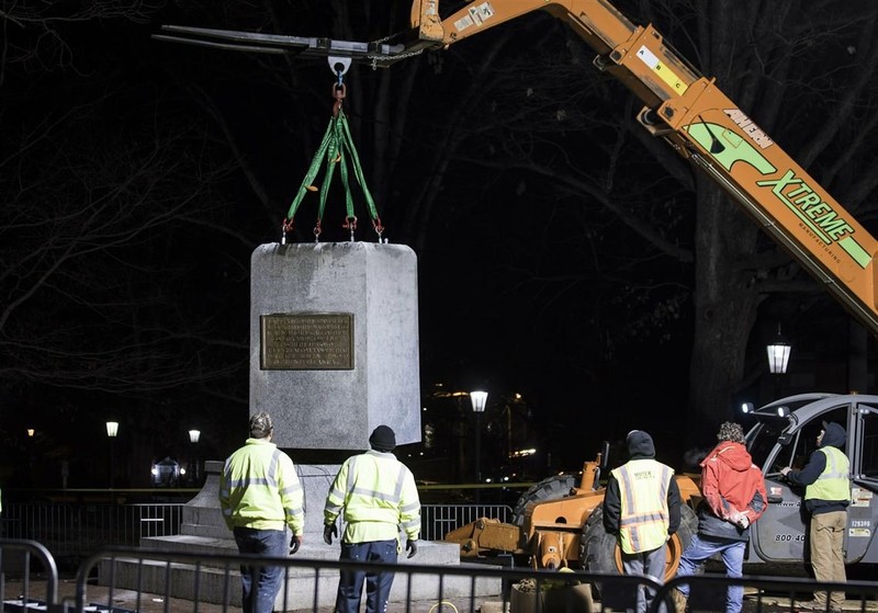 The Silent Sam pedestal and plaques being removed on January 14, 2019. 