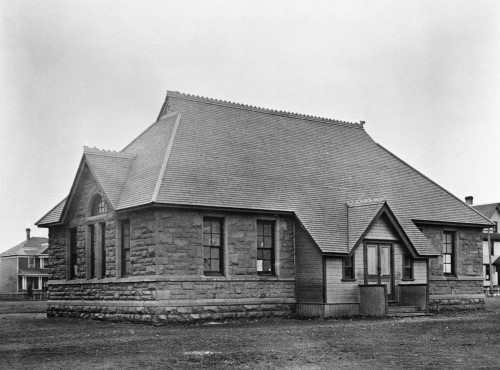 Black and white image of sandstone school