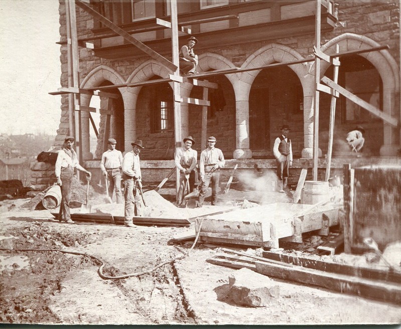 The original Alumni Hall under construction