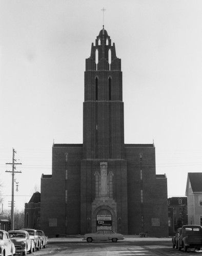 Black and white image of brick cathedral with sandstone accents