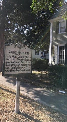 This historic marker denotes the boyhood home of two Confederate officers who invented explosives.