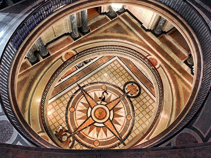A view from the top of the 85-foot rotunda looking down on the inlaid compass rose.