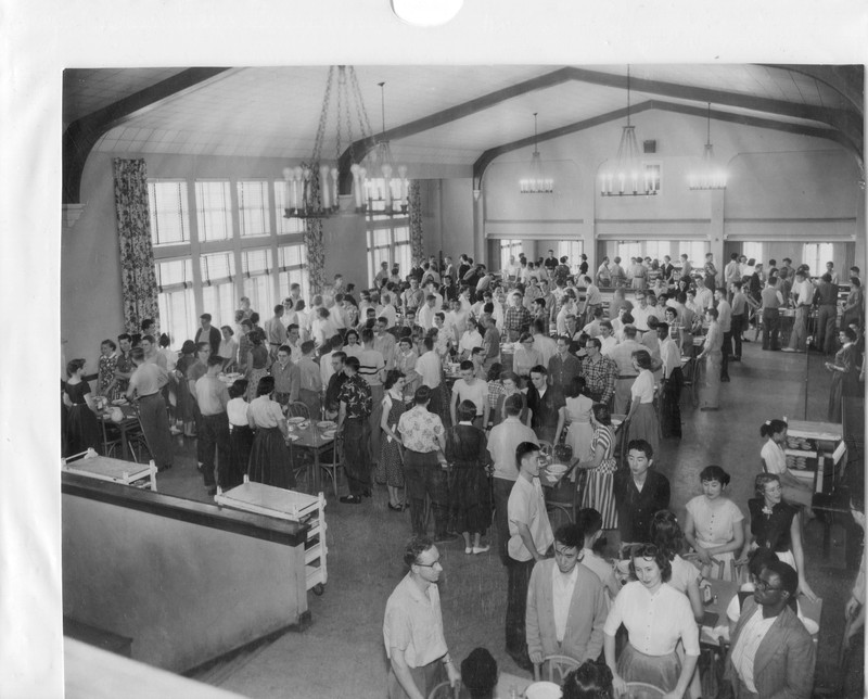 The student body stands before being seated for dinner