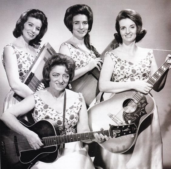 Mother Maybelle and the Carter Sisters. Front: Maybelle Carter. Back: Valerie June, Anita, and Helen Carter