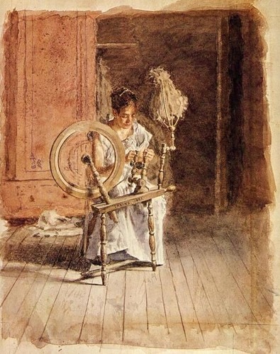 Girl spinning on a spinning wheel
