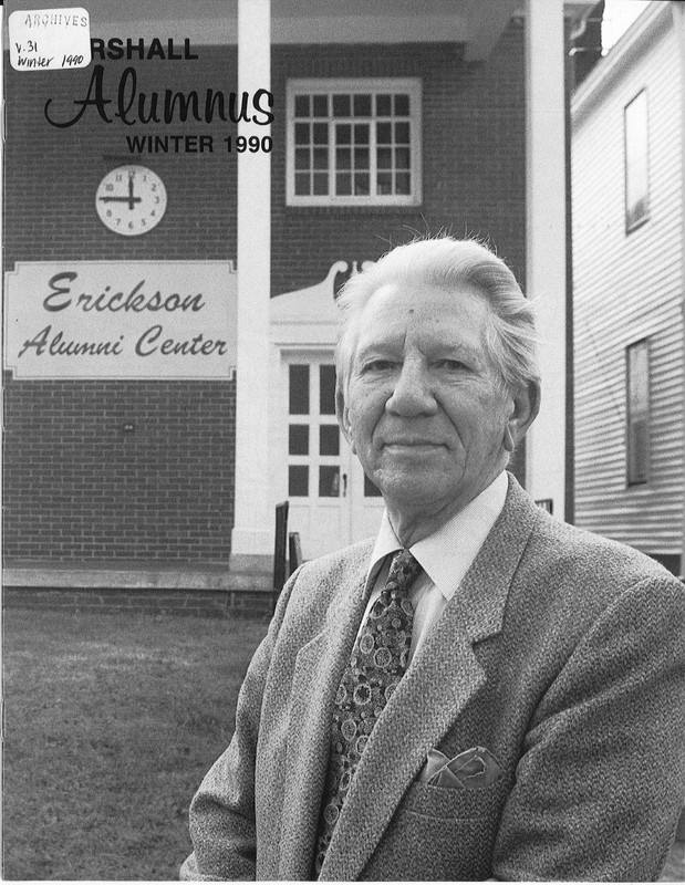 Charlie O. Erickson in front of the old Erickson Alumni Center that is now Harless Field.