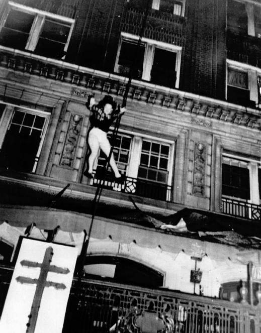 Photo by Arnold Hardy of daisy McCumber jumping from the building to escape the flames. She lived to the age of 86 according to Clio user James Hoadley.